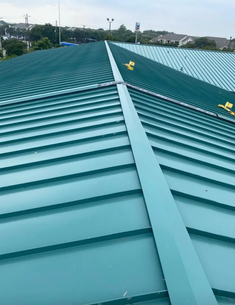 Green commercial metal roof ridge and valley for Metal Roof Repair in Laketown