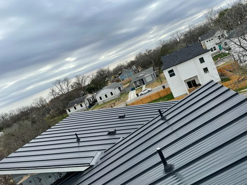 Standing seam metal roof panels with vents for Skylight Repair in Laketown